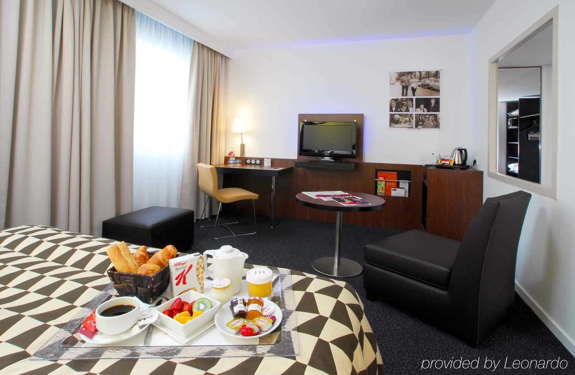 Hotel Mercure Lyon Centre Lumiere Стая снимка